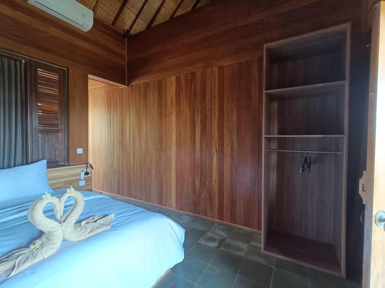 Putra'Lebah Amed Guest House מראה חיצוני תמונה