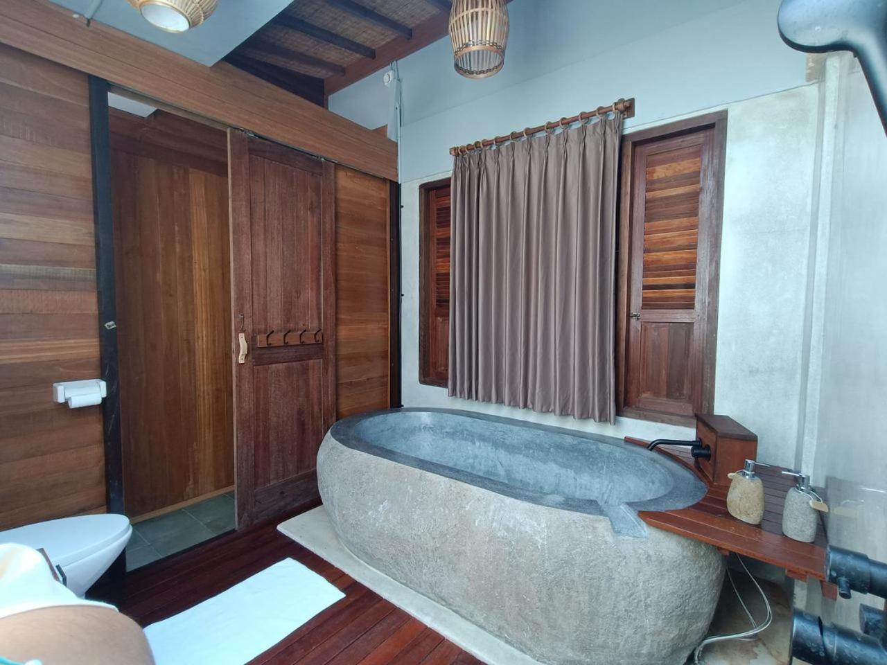 Putra'Lebah Amed Guest House מראה חיצוני תמונה