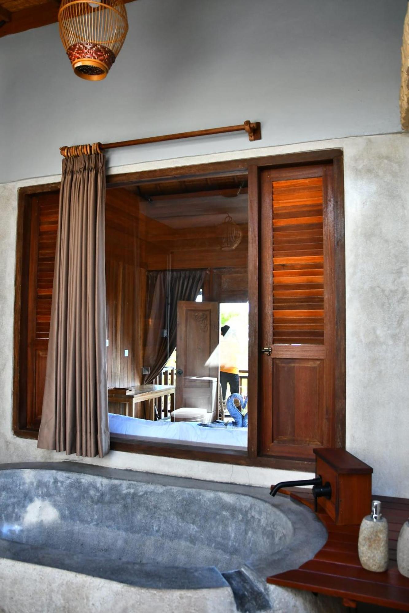 Putra'Lebah Amed Guest House מראה חיצוני תמונה