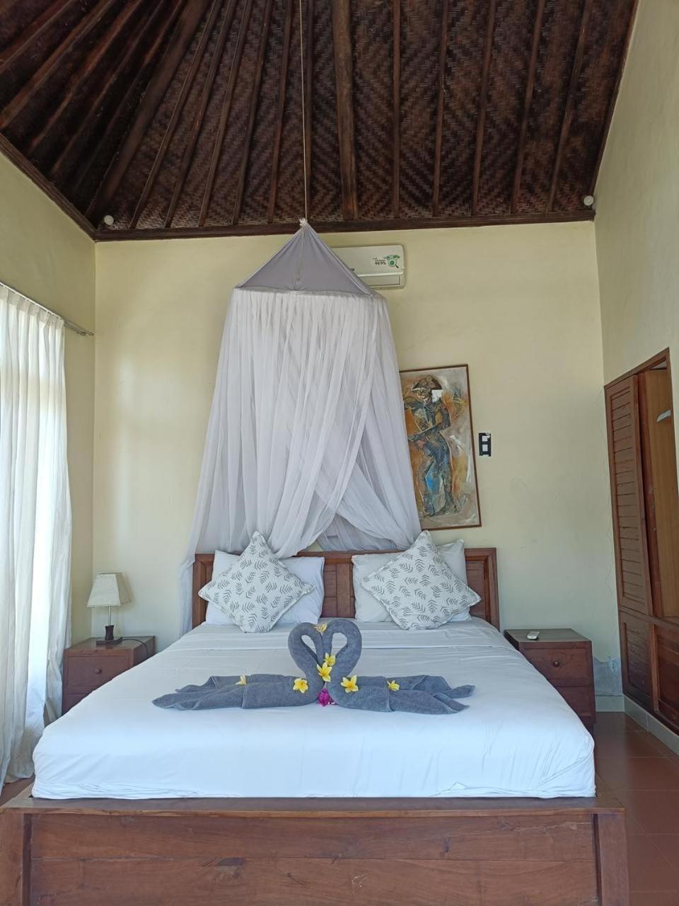 Putra'Lebah Amed Guest House מראה חיצוני תמונה